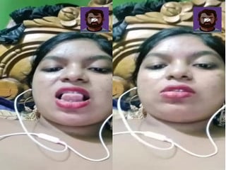 Girl showing off her massive tits while fingering.