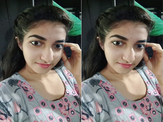 Cute desi Indian chick showing off her boobs in a hot scene