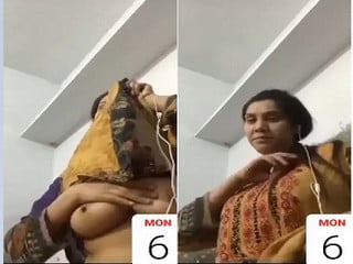 She's showing off her big Pakistani boobs.