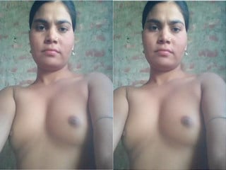 Indian girl in the village revealing her big breasts and wet pussy