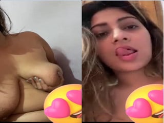 Sexy indian girl stripping during a video chat session.