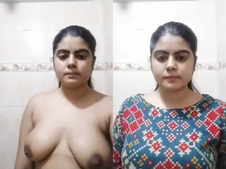 Indian girl flashing her breasts for amateur porn.