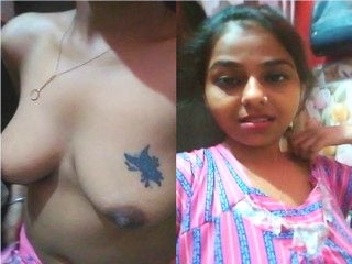 Indian desi chick flashing her breasts and snatch for you to see