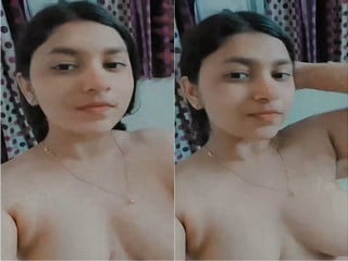 Cute desi girl exposes her boobies in this indian porn scene