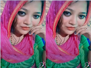 Indian girl strips and proudly displays sexy breasts for you.