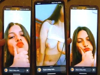 Indian girl strips and proudly displays sexy breasts for you.