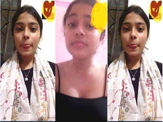 Indian girl strips and proudly displays sexy breasts for you.