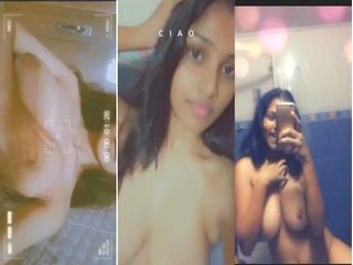 Indian girl strips and proudly displays sexy breasts for you.