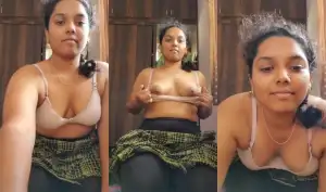 Sexy Des chick stripping and showing tits