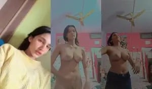 Indian girl strips and proudly displays sexy breasts for you.