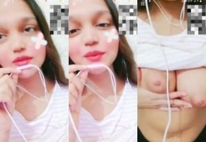 Indian girl strips and proudly displays sexy breasts for you.