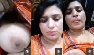 Amateur Pakistani babe showing off massive breasts.