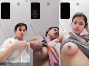 Indian girl strips and proudly displays sexy breasts for you.