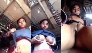 Cute desi village girl flashing her breasts for a camera shot.