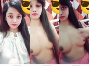 Indian girl strips and proudly displays sexy breasts for you.