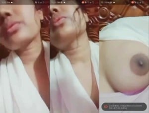 Indian girl strips and proudly displays sexy breasts for you.